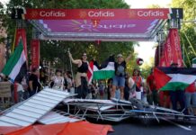 Propalestinos tomaron el stand de Cofidis en la línea de meta de La Vuelta en Madrid (Sind. Inquilinos e Inquilinas de Madrid).