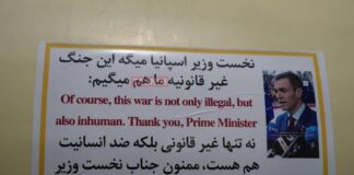 Cartel con imagen de Pedro Sánchez y mensaje en inglés y persa difundido por medios iraníes sobre la guerra