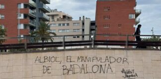 Pintada contra Xavier García Albiol en un muro del paseo marítimo de Badalona firmada por Jovent Republicà BDN.
